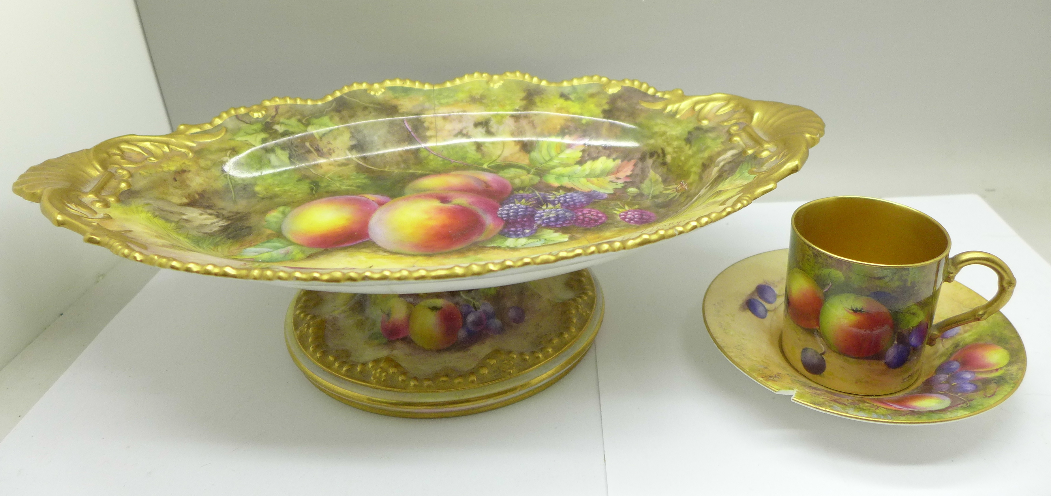 A Royal Worcester pedestal dish, hand decorated with fruit and signed T. Lockyer, (Thomas), 31.