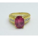 An 18ct gold, ruby and diamond ring, ruby approximately 4carat weight, 7.6g, O