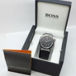A gentleman's Hugo Boss quartz chronograph wristwatch, boxed and with original receipt dated