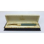 A Parker 65 fountain pen with 14ct gold nib and gold plated cap, with box