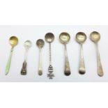 Seven silver salt condiment spoons including one enamelled marked Norway, enamel on bowl a/f,