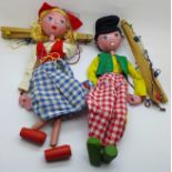 Two vintage Pelham puppets; Dutch girl and boy, with one box marked Dutch Boy