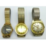 Three wristwatches, Timex, Newmark and one other