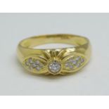 An 18ct gold, fifteen stone diamond ring, 3.2g, N