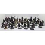 A collection of forty heavy Lord of the Rings figures, some labelled NLP 2004, tallest 8.5cm