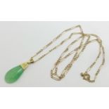A jade pendant on a yellow metal chain, chain 2.8g