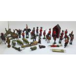 A collection of lead soldier figures and others