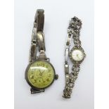 Two silver wristwatches, one with marcasite, one lacking second hand