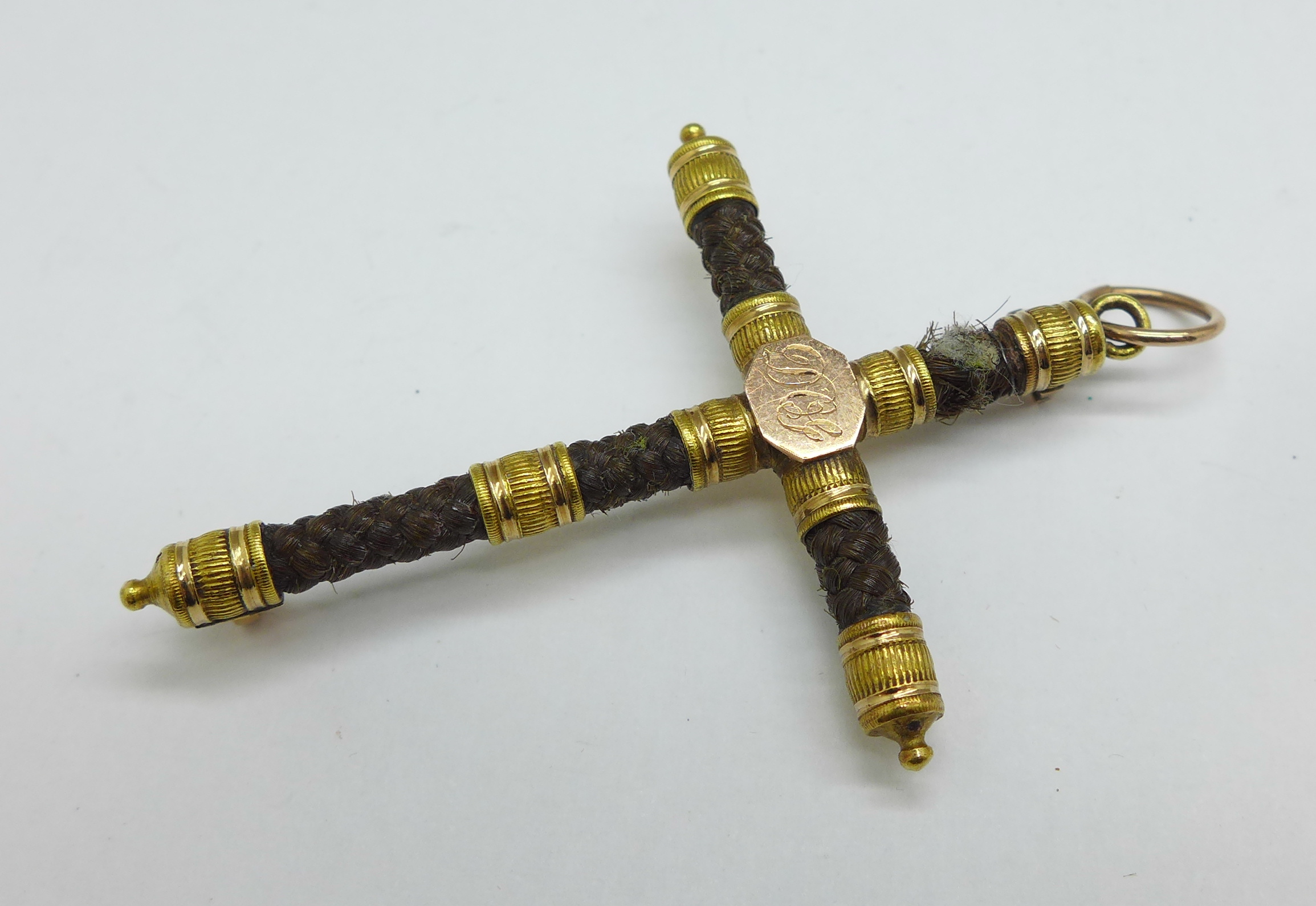 A Georgian yellow metal and hair mourning cross pendant or brooch, lacking pin, 54mm x 38mm