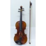 A cased violin, with paper label, Antonius Stradivarius, made in Czechoslovakia, a/f, back 333mm