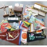 Leather cased bridge sets, one with silver clasp, a quantity of souvenir flags, crucifixes,