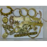 A collection of vintage gilt metal costume jewellery