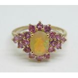 A 9ct gold, tourmaline and welo opal ring, 2.2g, O