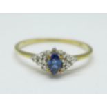 A 9ct gold, diamond and sapphire ring, 1.8g, W