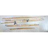 Five fishing rods, one marked Milward's Flymaster