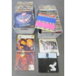 A collection of 7" records, mainly 1980's