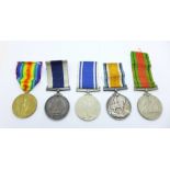 A set of five medals;-a pair of WWI medals and a George V Royal Naval For Long Service and Good