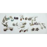 Fifteen pairs of silver earrings