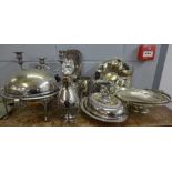 A collection of plated ware including a domed serving dish, tureen, dishes, tankards and a three