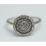 A 9ct white gold and diamond circular Art Deco cluster ring, 1.9g, K