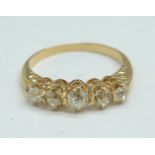 A yellow metal set, five stone diamond ring, (tests as high carat gold), 3g, N