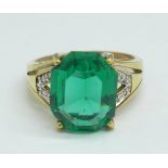 A 9ct gold, green stone ring with diamond accents, 3.2g, O