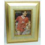 A framed signed photograph of Liverpool legend Kenny Dalglish