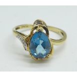 A 9ct gold, topaz and diamond ring, 1.9g, N