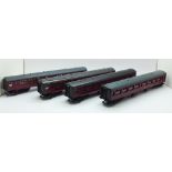 Four OO gauge model railway carriages by Hornby