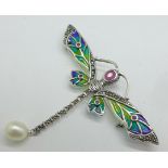 A silver plique-a-jour dragonfly brooch set with ruby and pearl, 55mm x 68mm