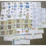 Fifty-four stamp first day covers;-twenty-five WWF, ten Henry VIII, eight Christmas and eleven