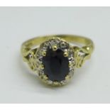 A 9ct gold, sapphire and diamond cluster ring, 3.1g, N