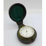 A pocket barometer with fitted case, (case fastening clip a/f)