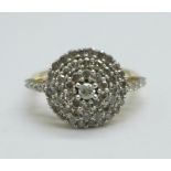 A 9ct gold, diamond cluster ring, 3.1g, N