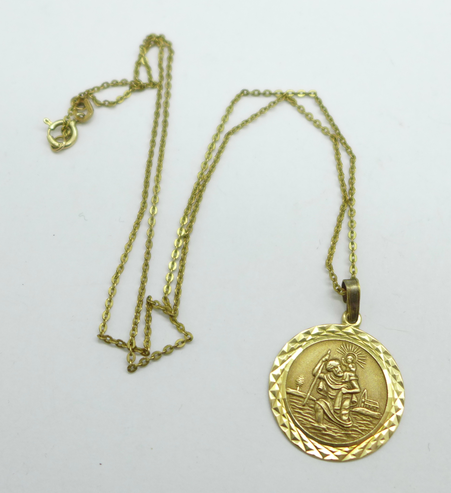 A 9ct gold St. Christopher pendant and chain, 2.5g, chain 41cm