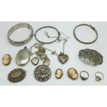 Four silver lockets and chains, three silver bangles, a Victorian hallmarked silver brooch, three