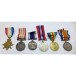 Four Naval medals to K. 18228, H.T. Perry Sto. 1., R.N.; comprising WWI trio and a George V Royal