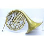 A French horn, marked Lewington, London, bears initials K.M.I.
