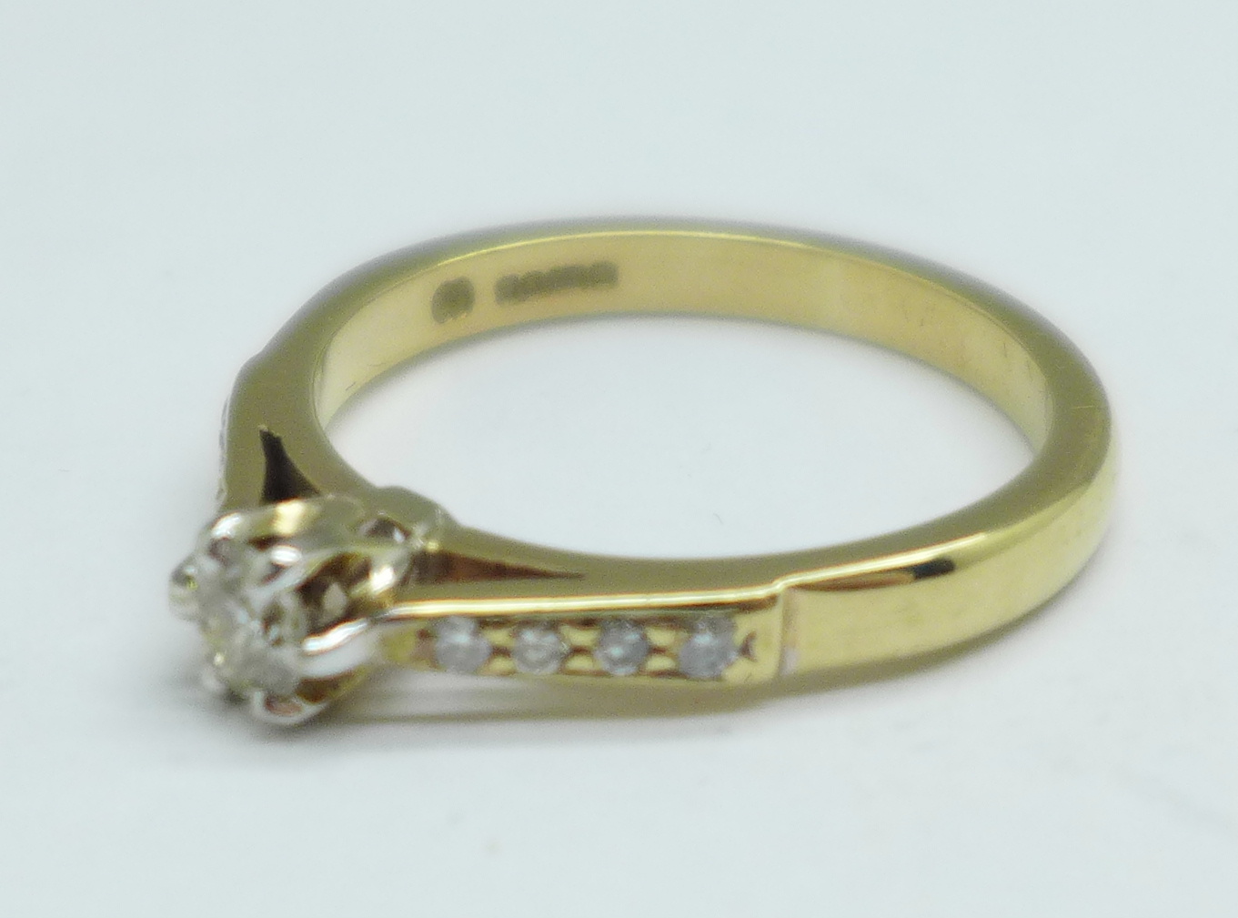 A 9ct gold and nine stone diamond ring, 3g, P, main stone approximately 0.25carat weight - Image 2 of 3