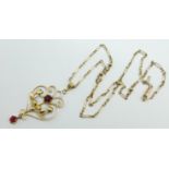 A 9ct gold pendant and chain, 4.4g, chain 42cm, (smaller red stone a/f)