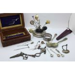 A hallmarked silver scissors holder for a chatelaine, carved box, a pin cushion and pins, spoons,