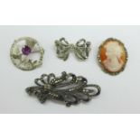 Four silver brooches