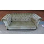 A Victorian style fabric upholstered Chesterfield settee