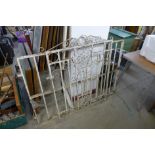 Two painted wrought iron garden gates