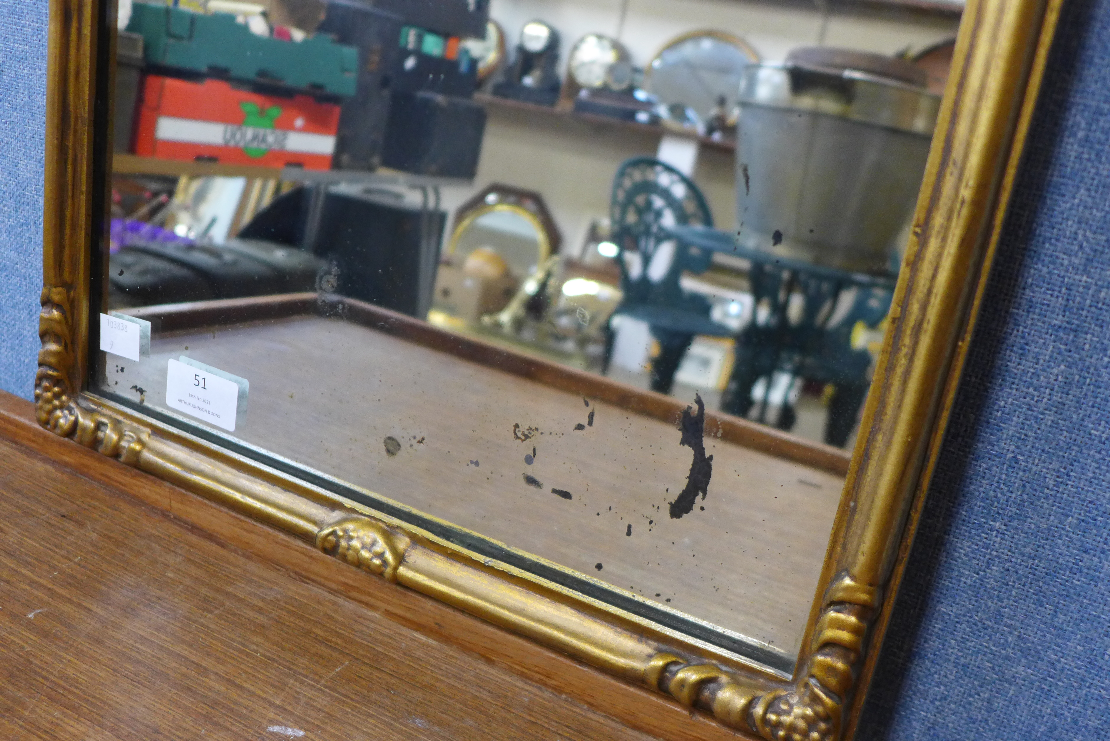 A rococo style gilt framed mirror, 69cms h - Image 2 of 2