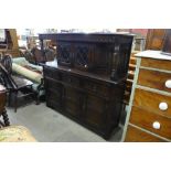 A carved oak court cupboard