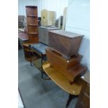 A teak corner cupboard, coffee table, two sewing boxes and a hostess trolley