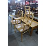 A pair of beech elbow chairs