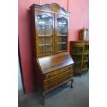 A George I style walnut and mahogany bookcase, 205cms h, 94cms w, 49cms d