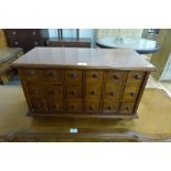 A hardwood spice drawer cabinet